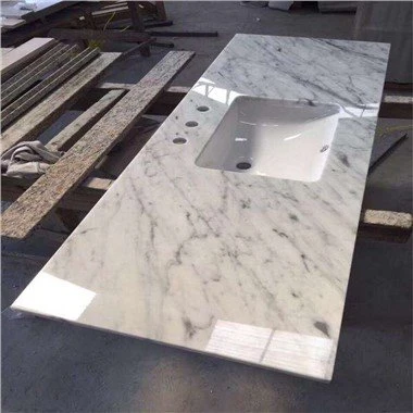 White Kitchen with White Marble Countertops