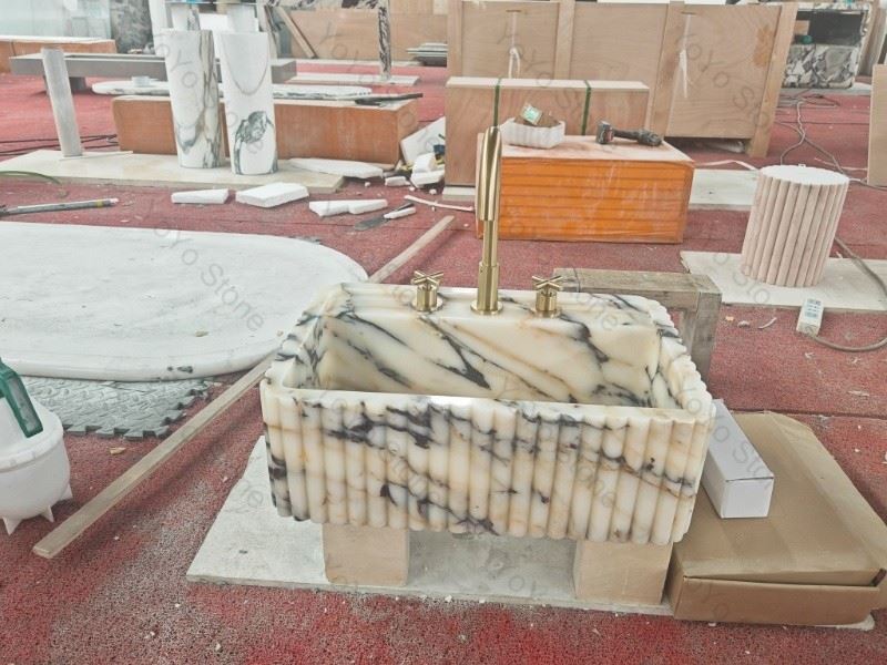 small marble wash basin